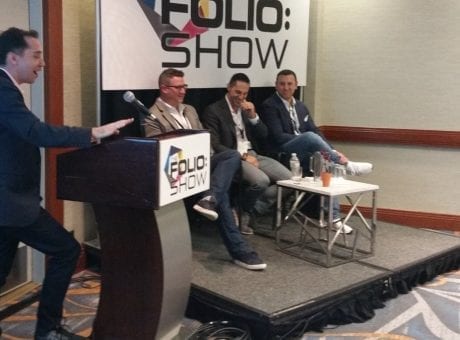 man giving presentation with panel