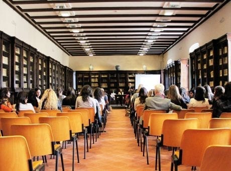 classroom with adults on chairs