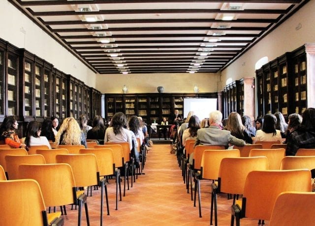 classroom with adults on chairs