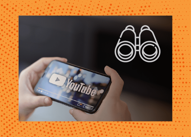 Two hands hold a smartphone with YouTube on it. Binoculars are in the upper right corner of the image.